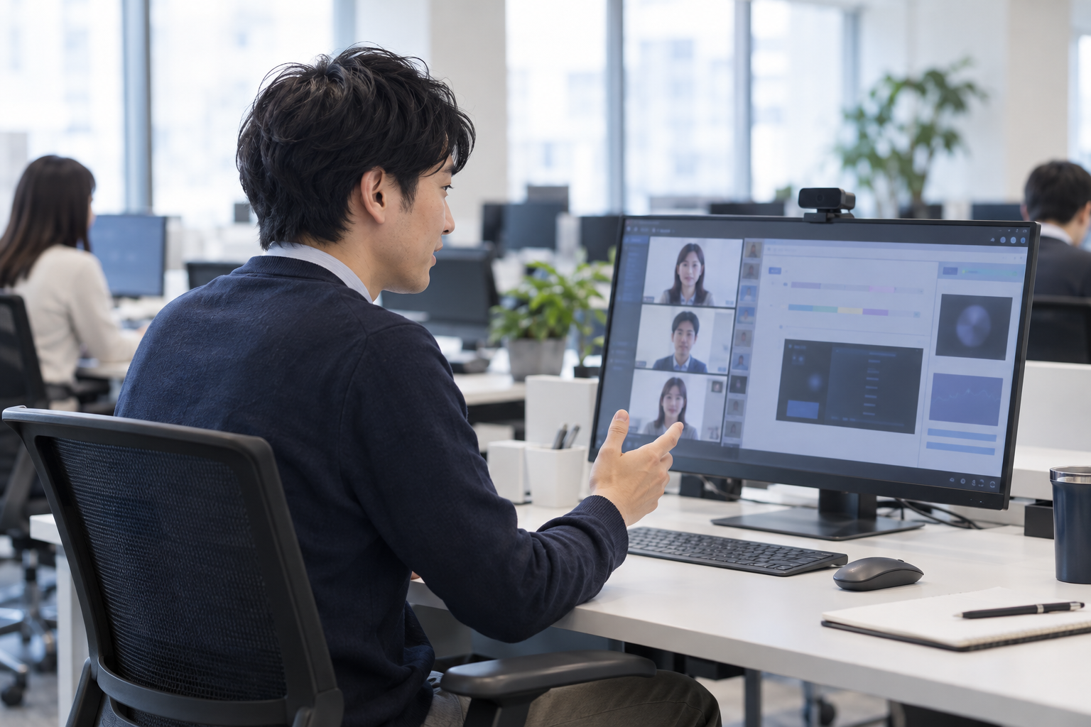 仕事風景のイメージ（AI生成・架空の人物と職場）